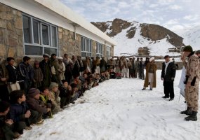 Patrol of Lithuanian-led PRT-10 delivered aid and instructions on mine hazard in Sufak village,... - 1