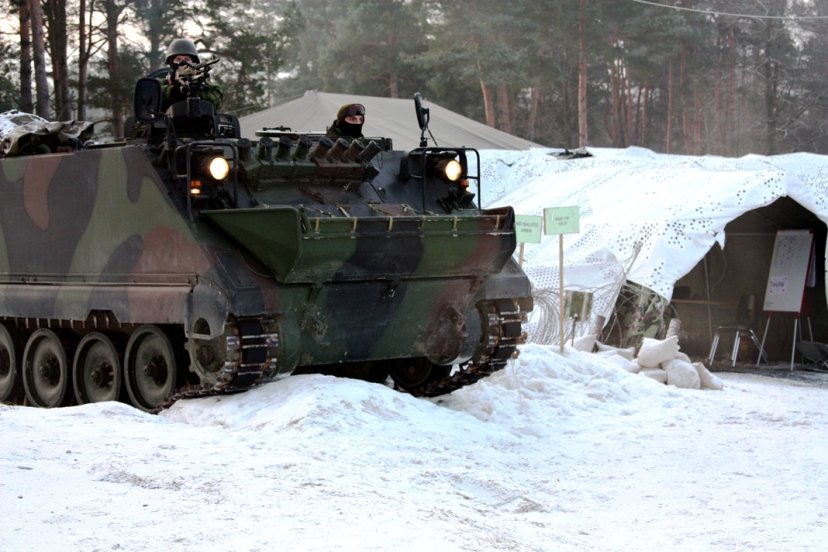 Troops of the Mechanised Infantry Brigade Iron Wolf prepare for a Danish-hosted military exercise 