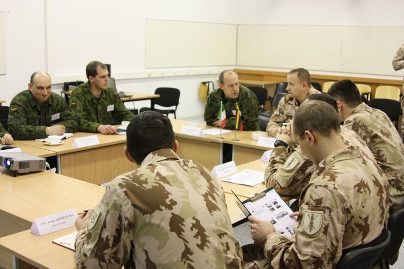 Military personnel train operational planning and implementation before deployment to Afghanistan 