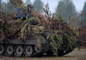 Lithuanian and U.S. soldiers were destroying armoured combat materiel of hostile forces with... - 1
